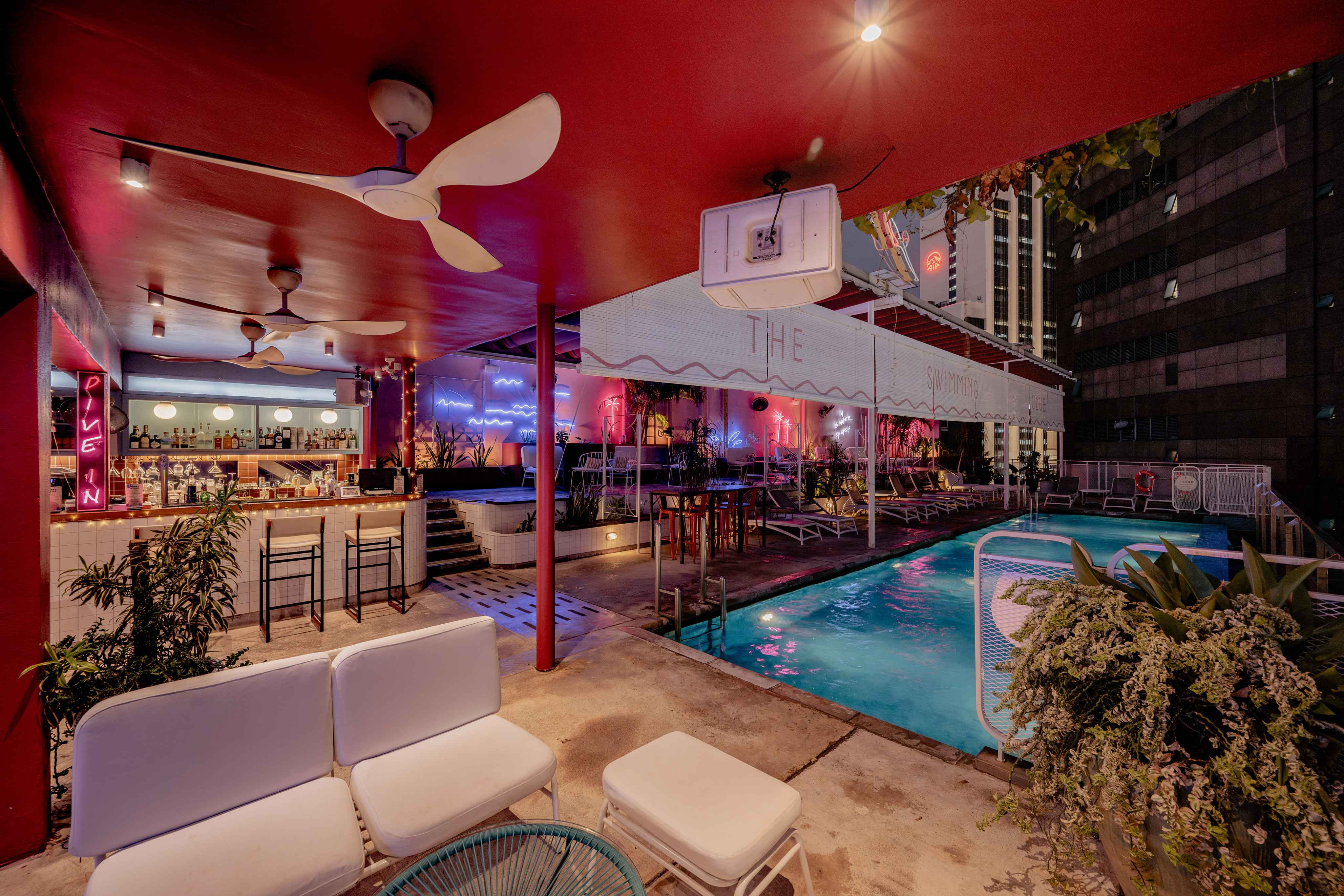 Aerial view of the chic Swimming Club with infinity pool at KL Journal Hotel